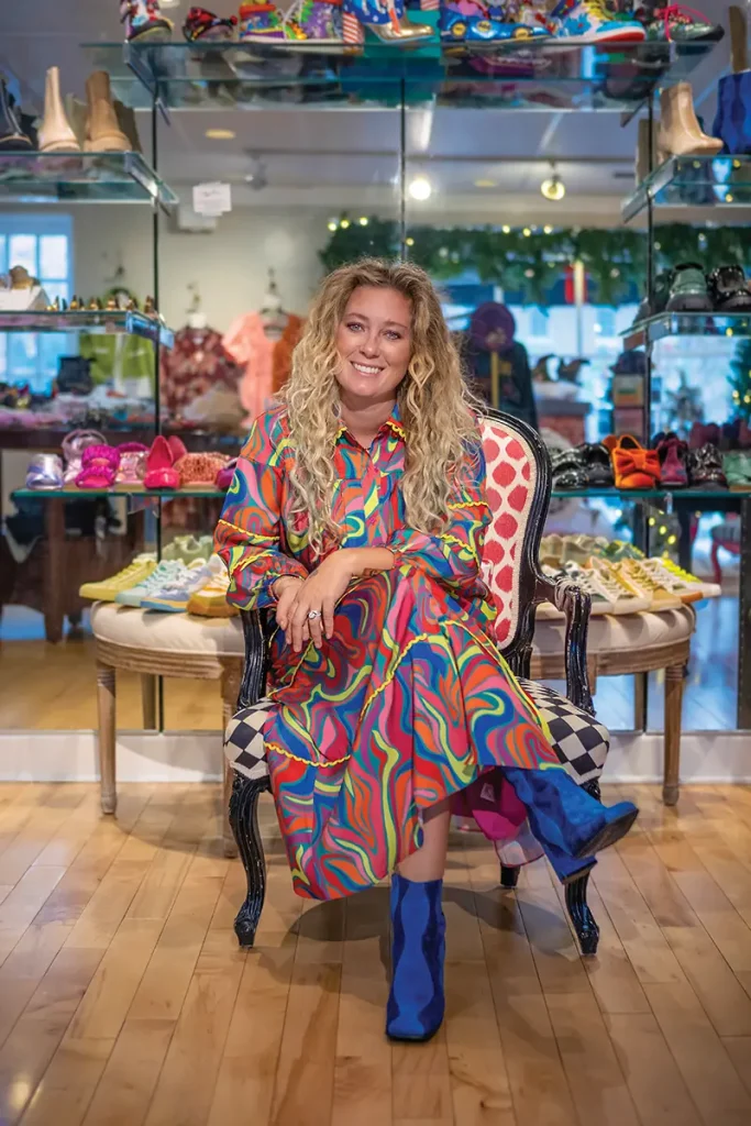 Even closet basics are conversation starters at The Shoe Attic, owned by Brittany Rolston (pictured), including their collection of shoes by British designer Irregular Choice (photo at top).