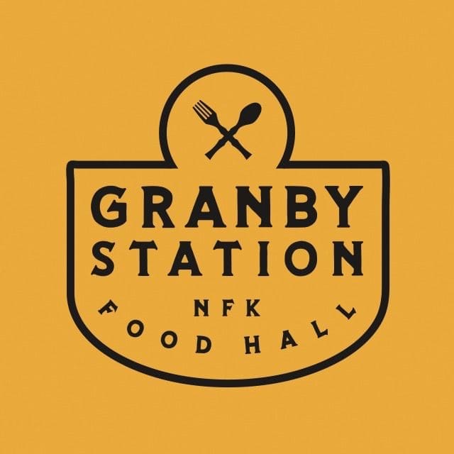 Granby Station NFK Food Hall logo: black outline badge with crossed fork and spoon on a mustard yellow background.