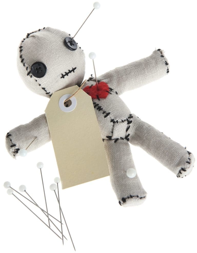 Cute handmade voodoo doll (Made completely by me) with a blank tag, being stabbed by pins
