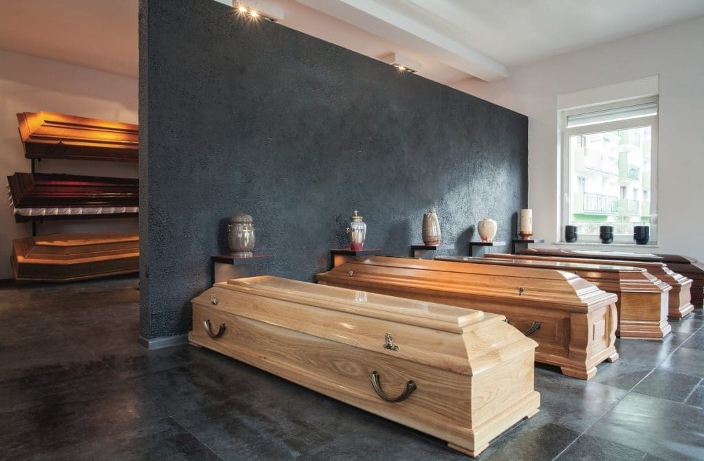 Coffins standing in funeral house