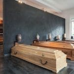 Coffins standing in funeral house